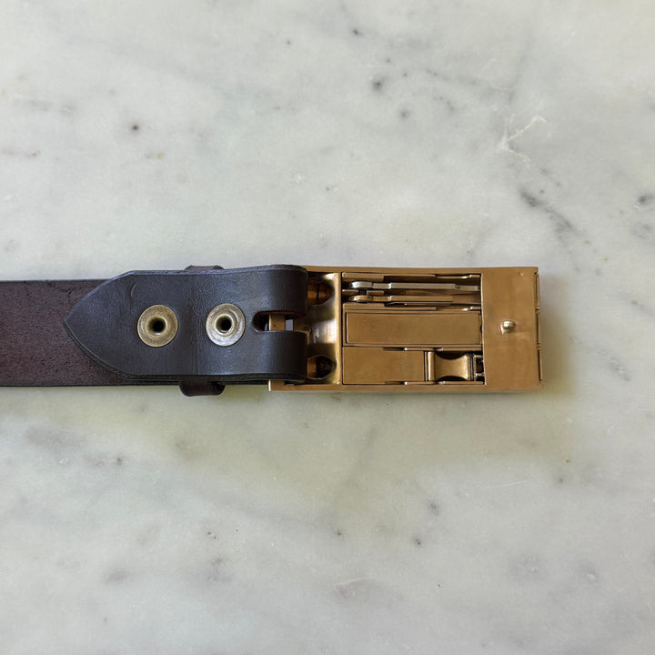 THE BELT BUCKLE