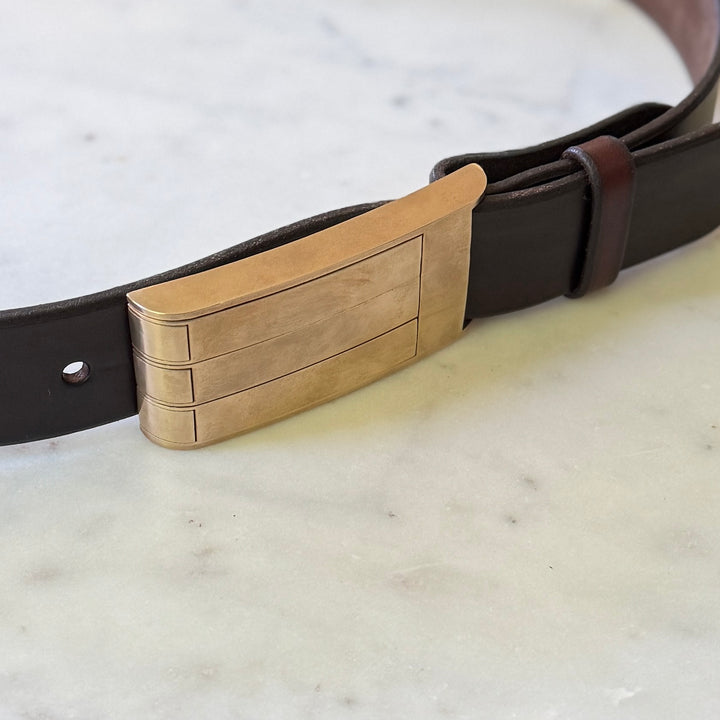 THE BELT BUCKLE