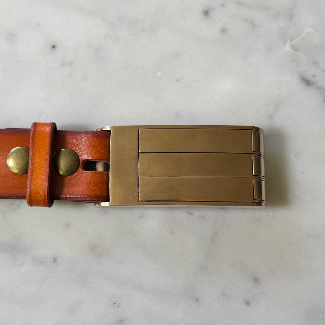 THE BELT BUCKLE