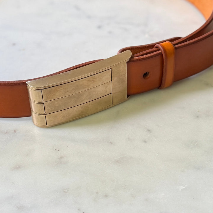 THE BELT BUCKLE