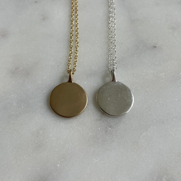 Small engravable pendant in bronze and sterling silver