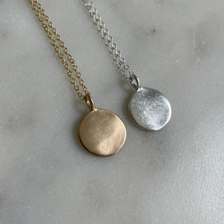 Small engravable pendant in bronze and sterling silver