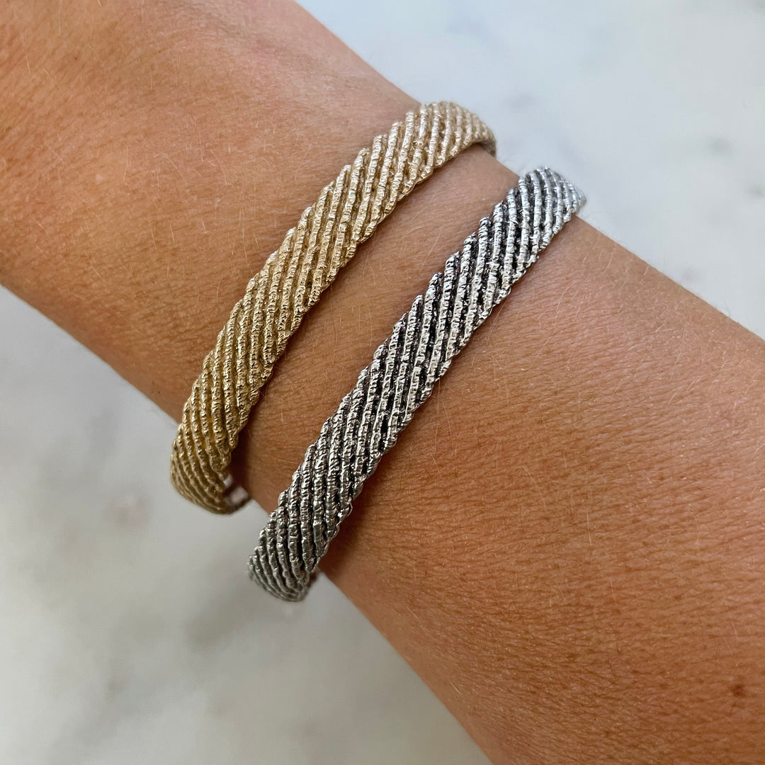 Woman Wears the MIMOSA Friendship Bracelet Named Michelle in Bronze and Sterling Silver