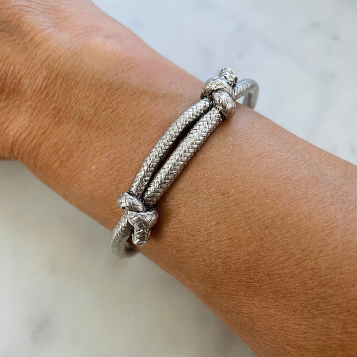 Woman Wears the MIMOSA Handcrafted Sterling Silver Friendship Bracelet Named Corrie