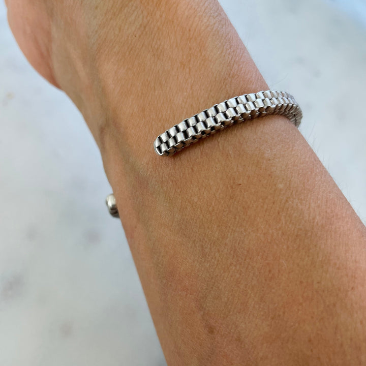 Woman Wears the MIMOSA Handcrafted Sterling Silver Friendship Bracelet Named Ashley