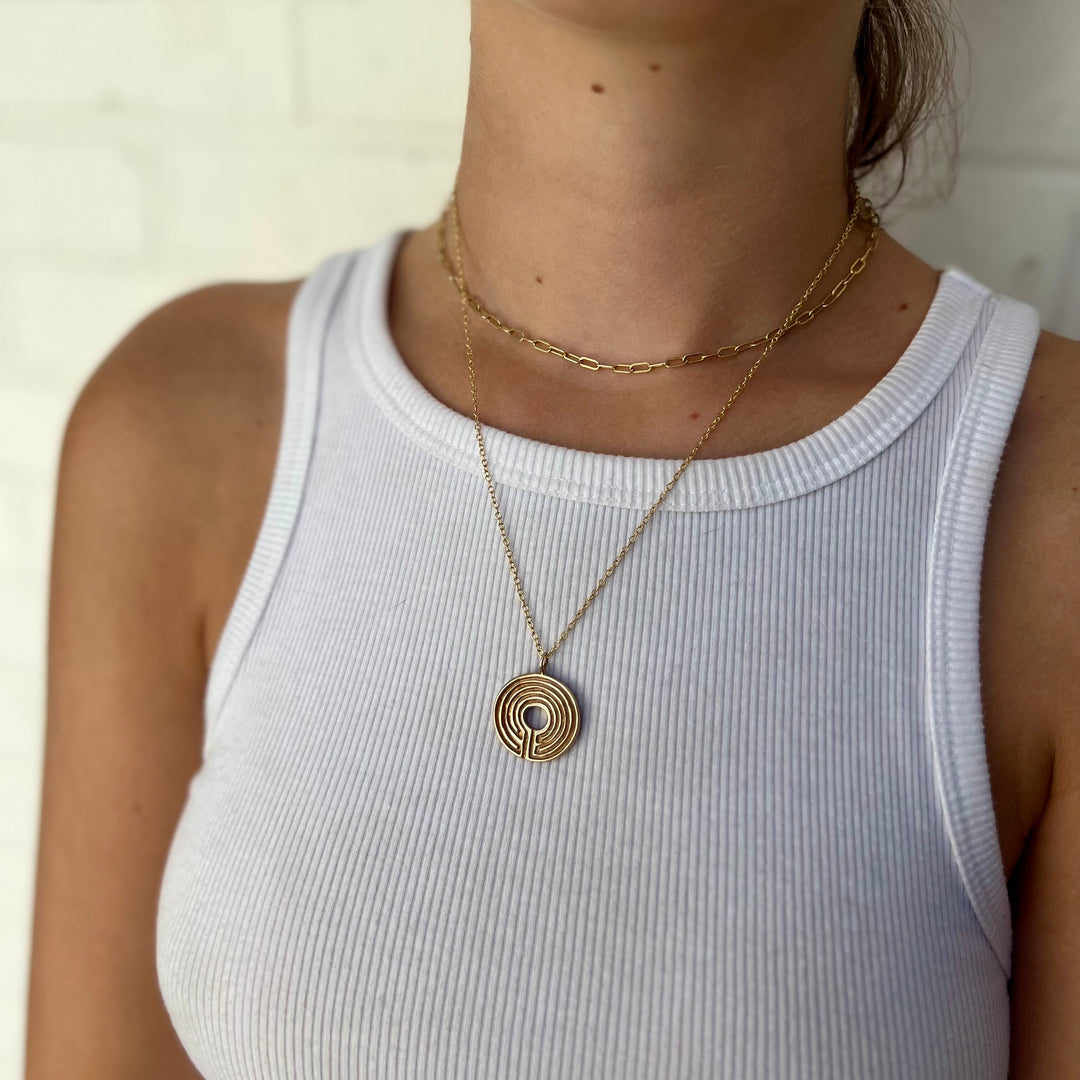 Woman Wearing Handcrafted Labyrinth Pendant Necklace