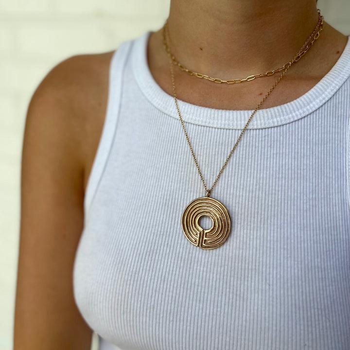 Woman Wearing Handcrafted Labyrinth Pendant Necklace