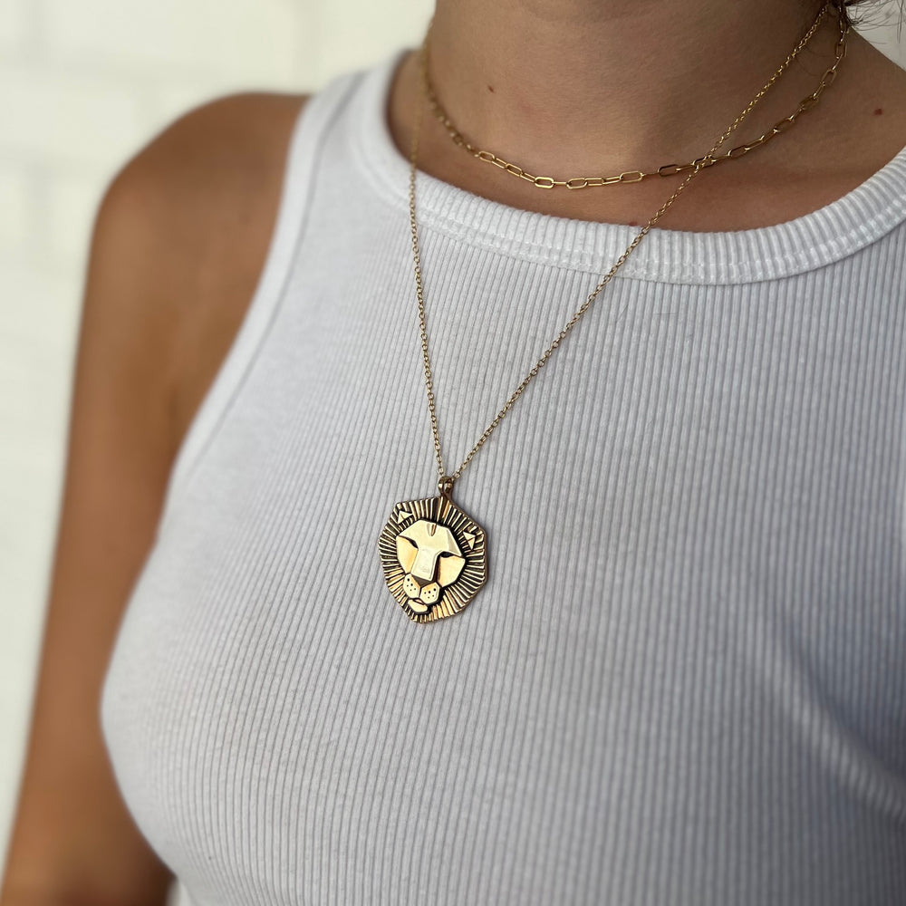 Woman Wearing Handcrafted Lion Head Pendant Necklace