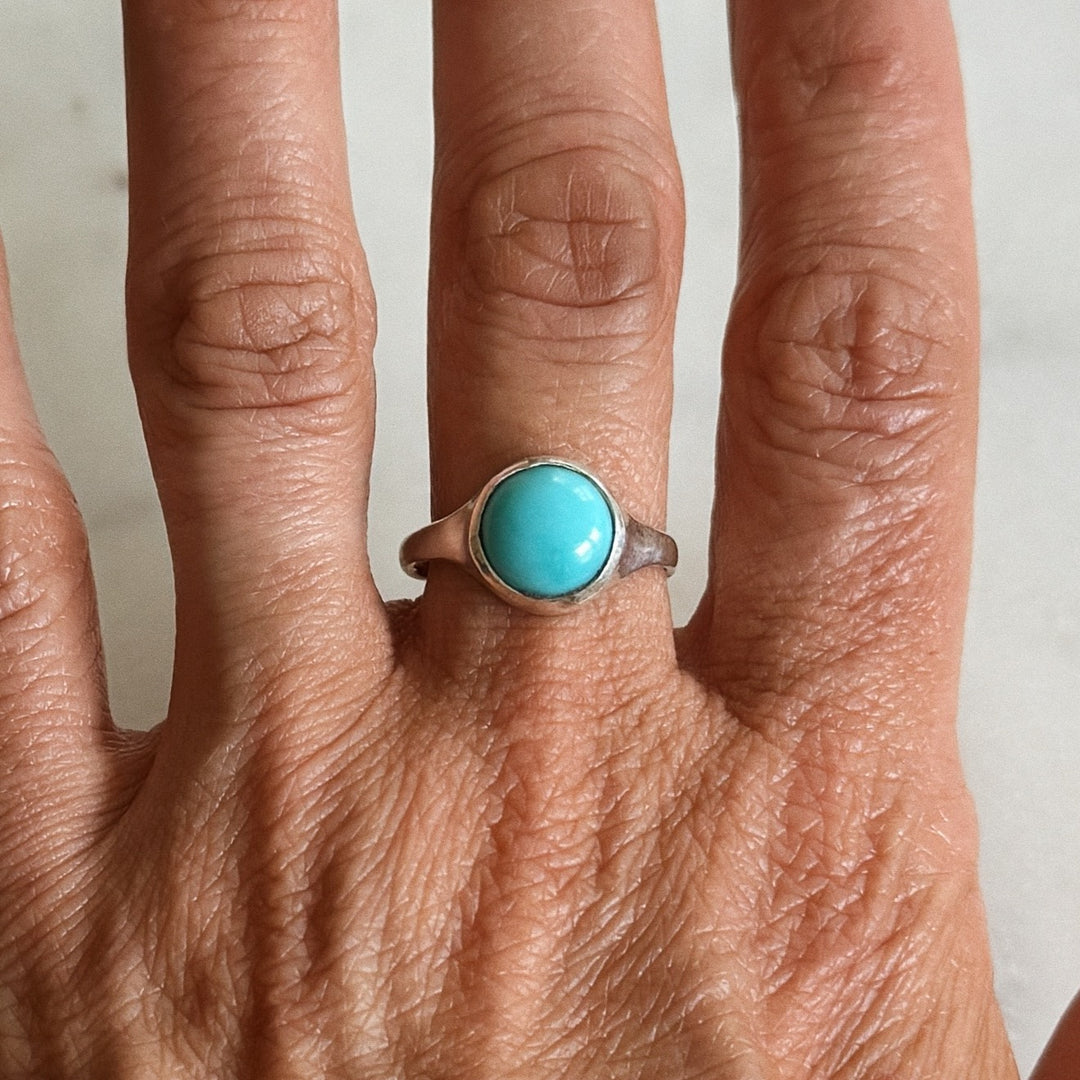 Person Wears Silver Turquoise Gemstone Ring with Ten Millimeter Stone | MIMOSA Handcrafted