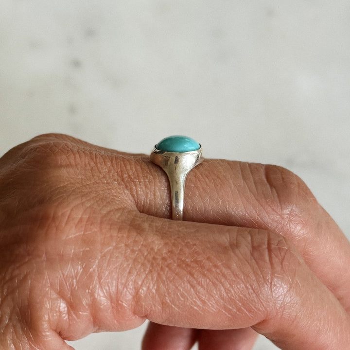 Person Wears Silver Turquoise Gemstone Ring with Ten Millimeter Stone | MIMOSA Handcrafted