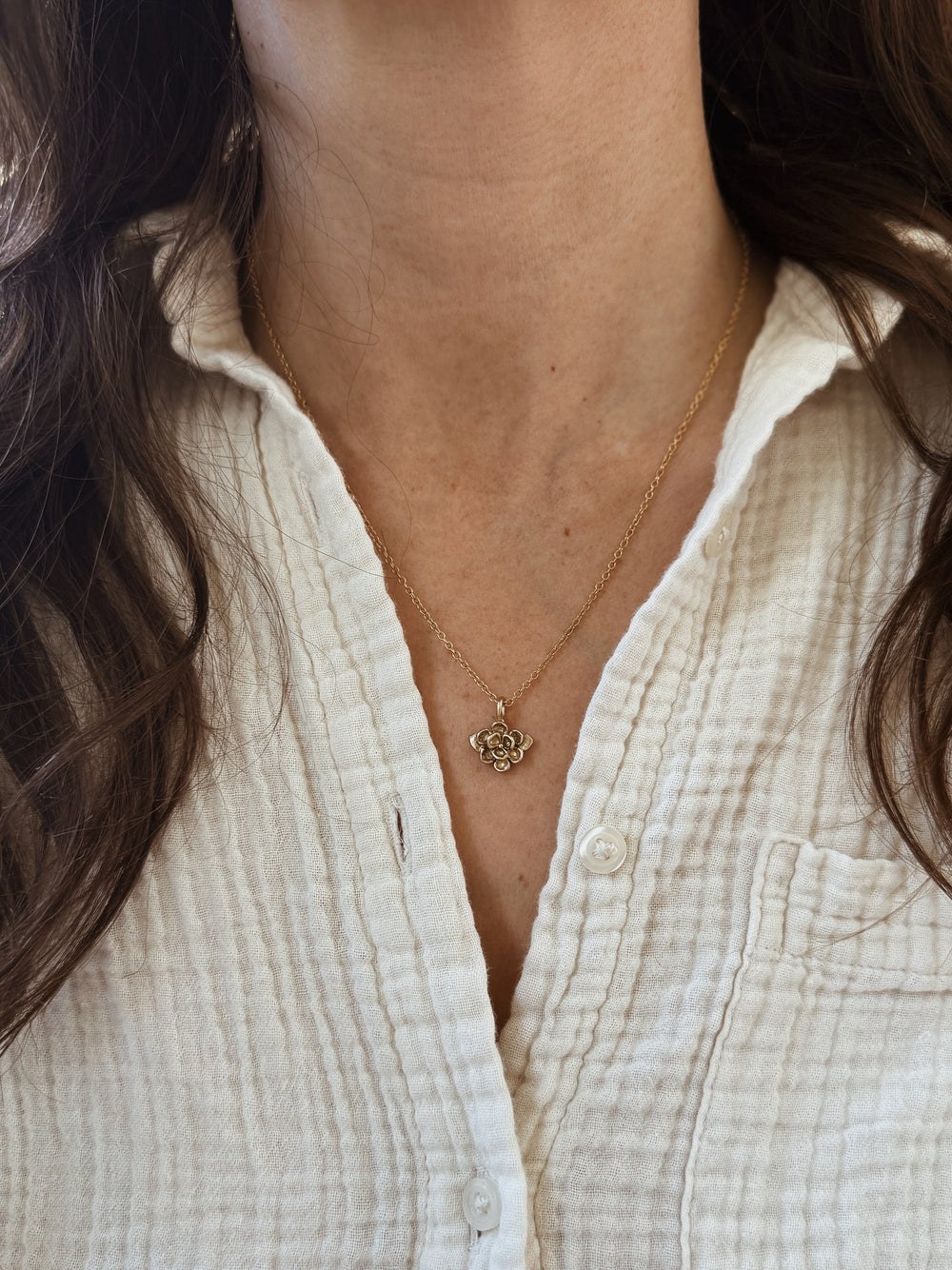 Woman Wears the MIMOSA Handcrafted 14K Gold Small Magnolia Pendant