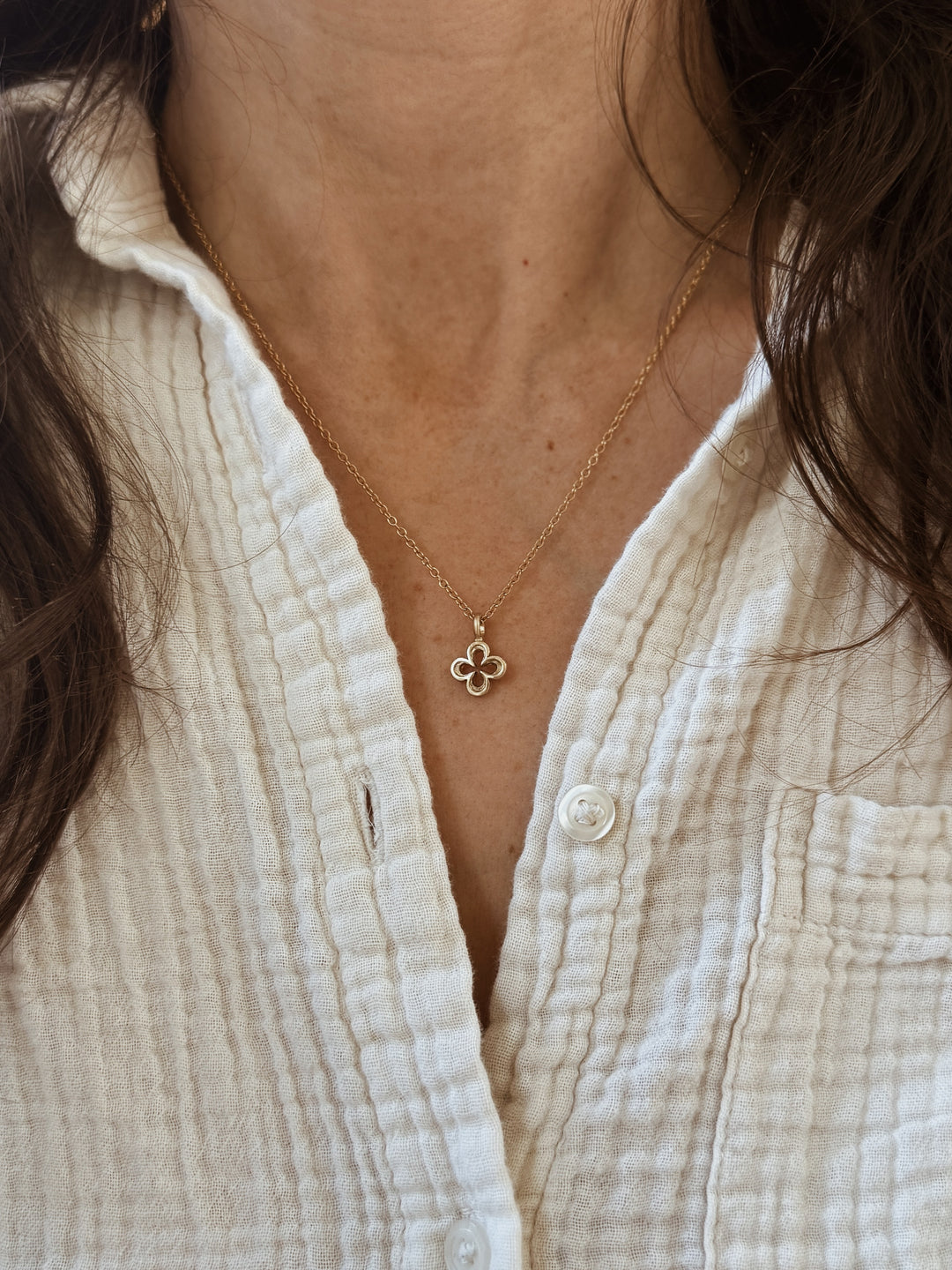 Woman Wears the MIMOSA Handcrafted 14K Gold Small Quatrefoil Pendant