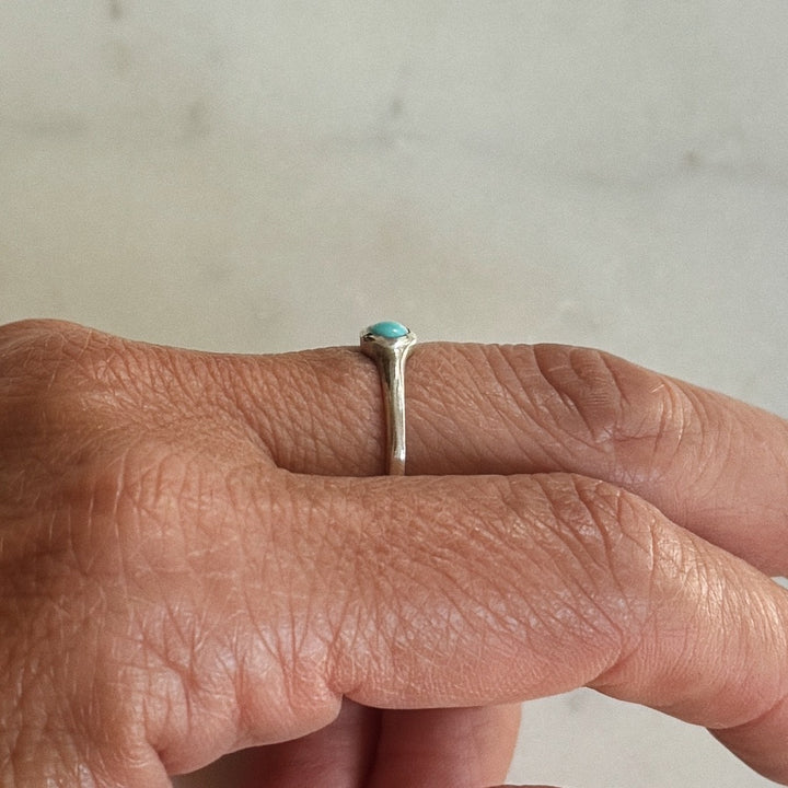 Person Wears Silver Turquoise Gemstone Ring with Four Millimeter Stone | MIMOSA Handcrafted