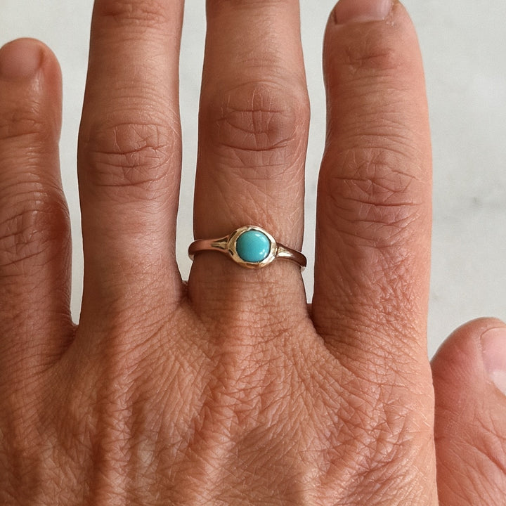 Person Wears Bronze Turquoise Gemstone Ring with Six Millimeter Stone | MIMOSA Handcrafted