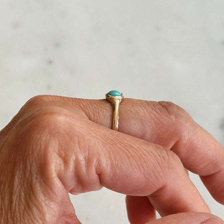 Person Wears Bronze Turquoise Gemstone Ring with Six Millimeter Stone | MIMOSA Handcrafted