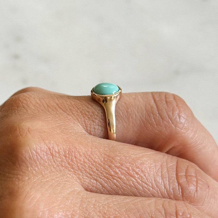 Person Wears Bronze Turquoise Gemstone Ring with Eight Millimeter Stone | MIMOSA Handcrafted