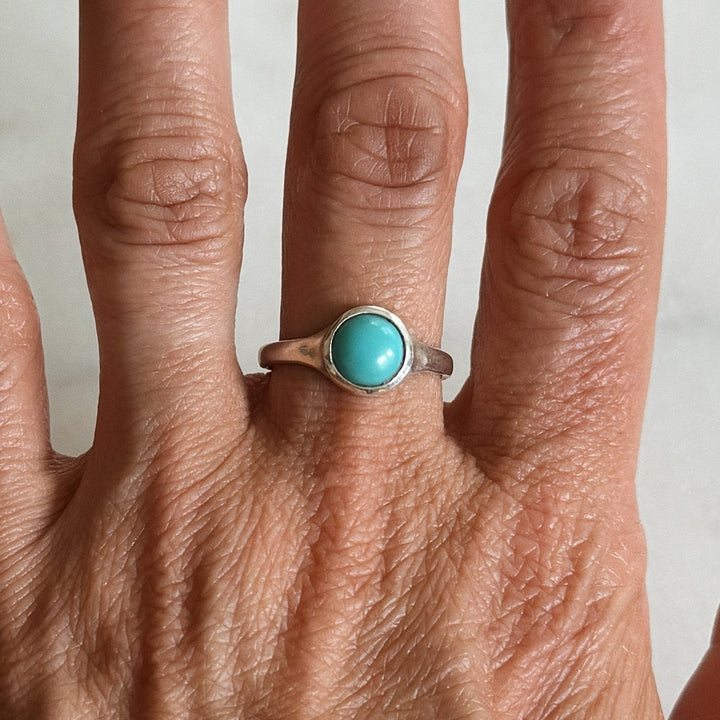 Person Wears Silver Turquoise Gemstone Ring with Eight Millimeter Stone | MIMOSA Handcrafted