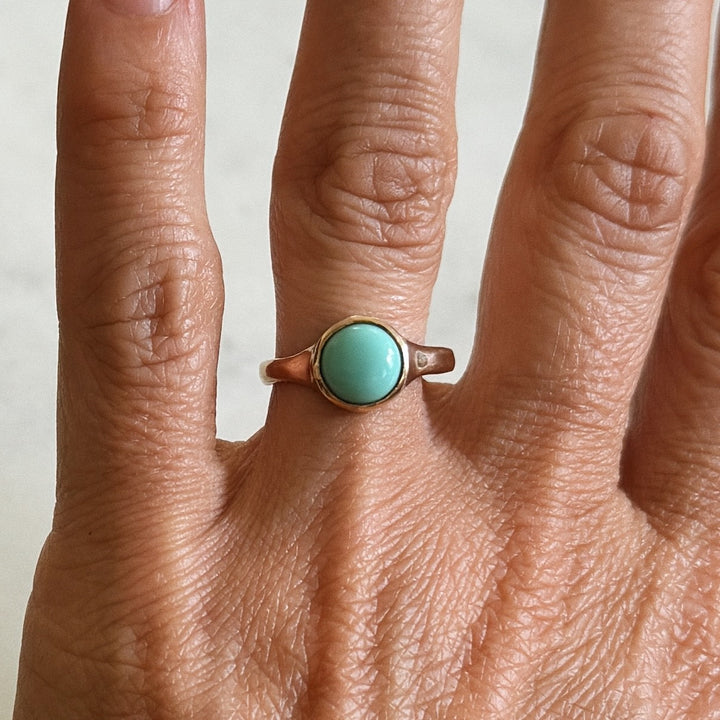 Person Wears Bronze Turquoise Gemstone Ring with Eight Millimeter Stone | MIMOSA Handcrafted