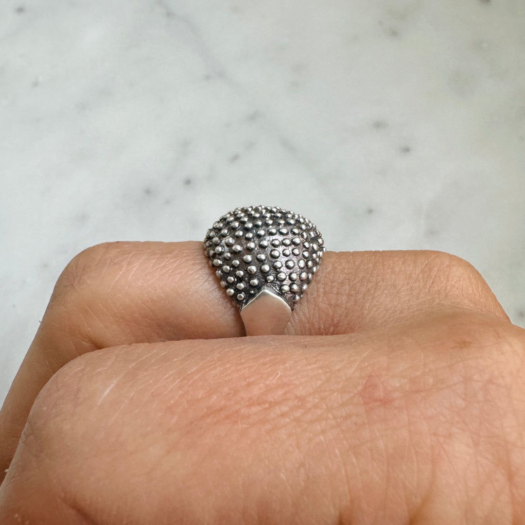 Woman Wears the MIMOSA Handcrafted Mock Strawberry Ring in Sterling Silver