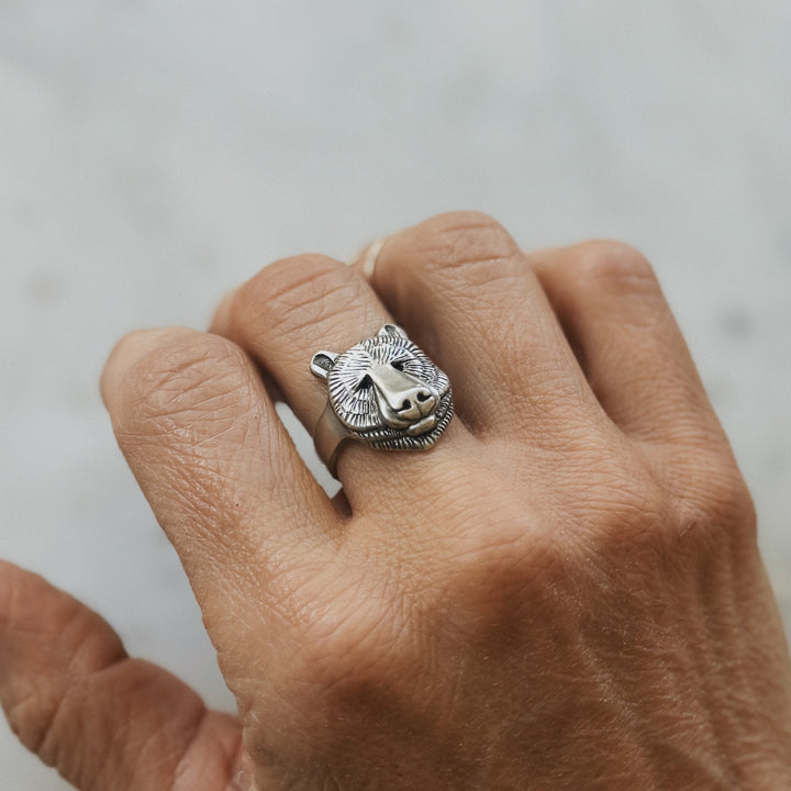 Hand Wearing Bear Head Ring in Sterling Silver