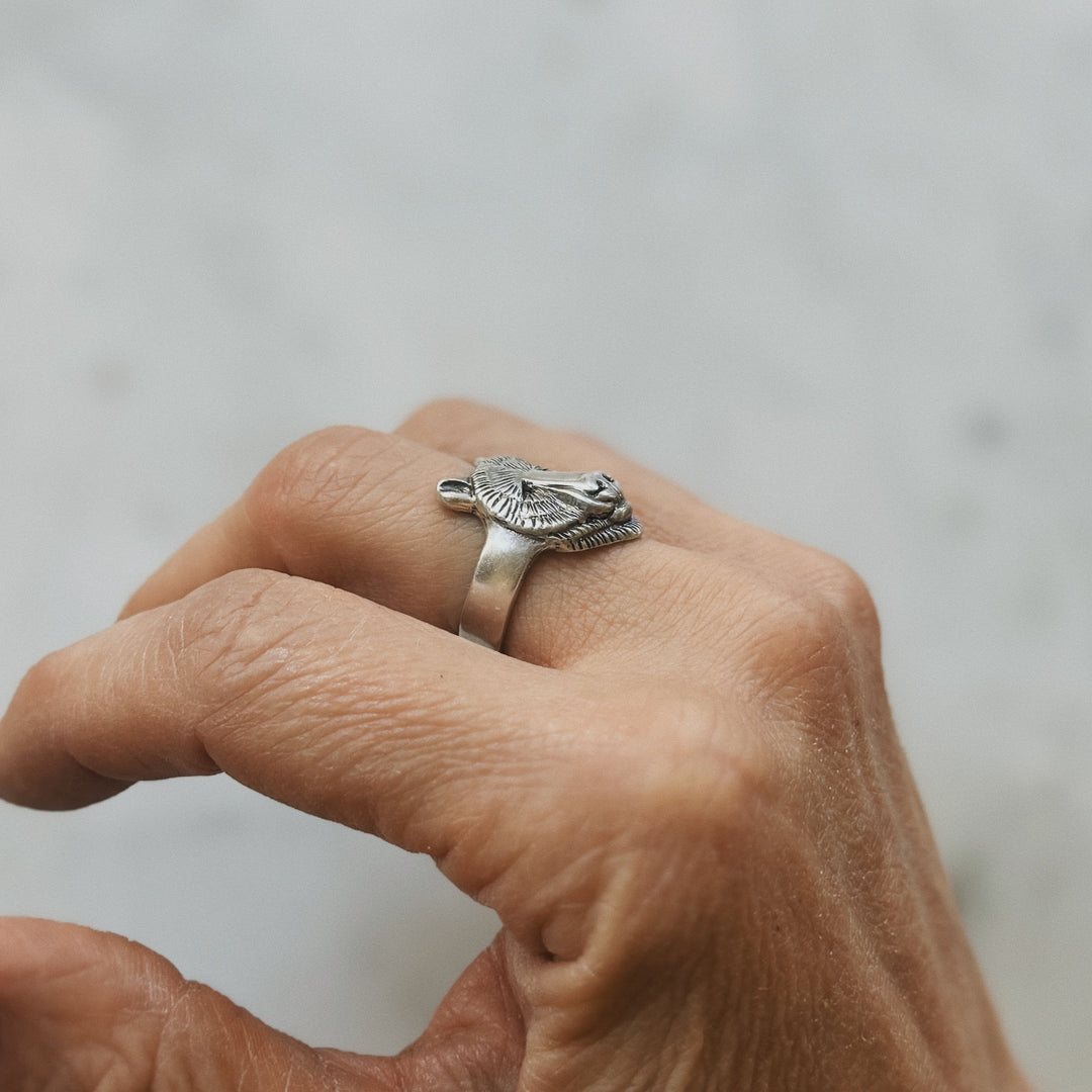 Hand Wearing Bear Head Ring in Sterling Silver
