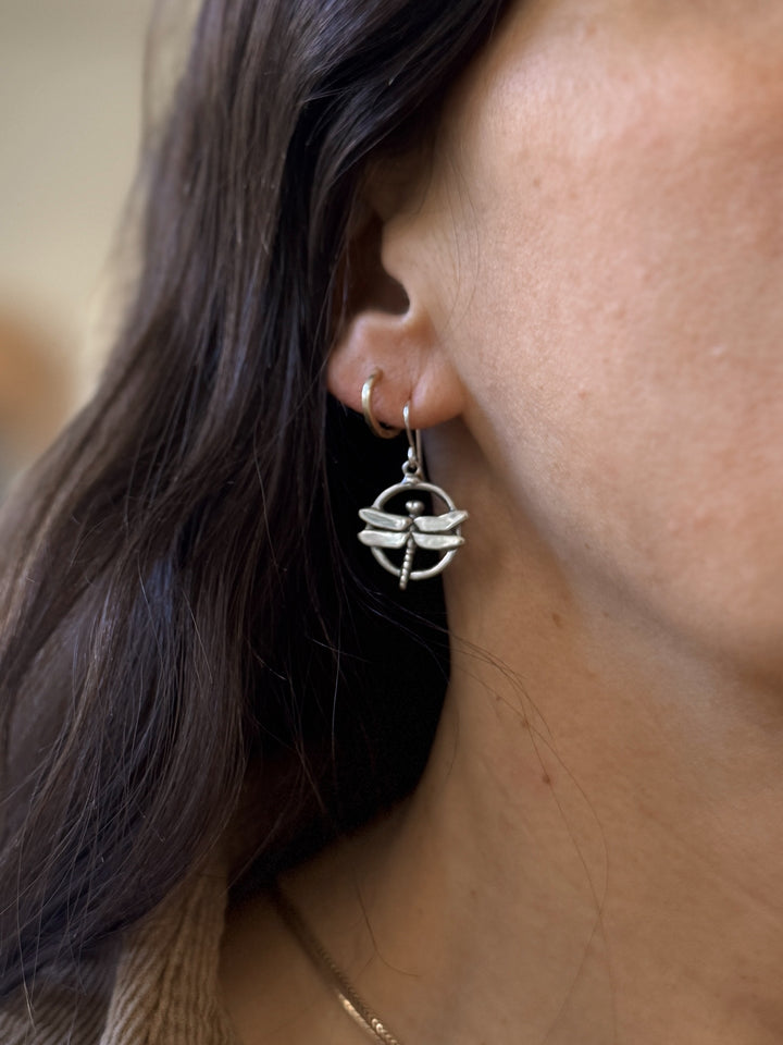 Woman Wears Dragonfly Earrings in Sterling Silver