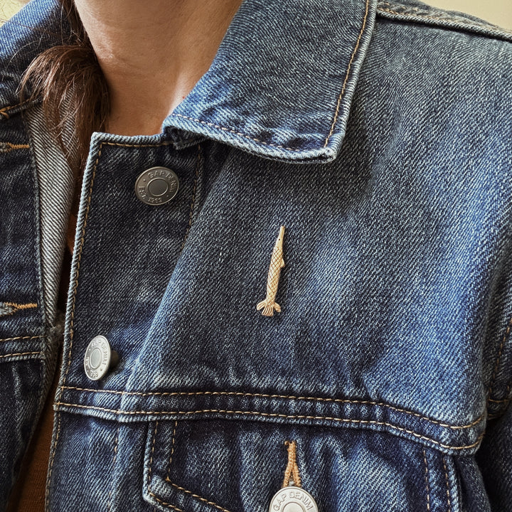 Person Wears the MIMOSA Handcrafted Alligator Gar Fish Pin