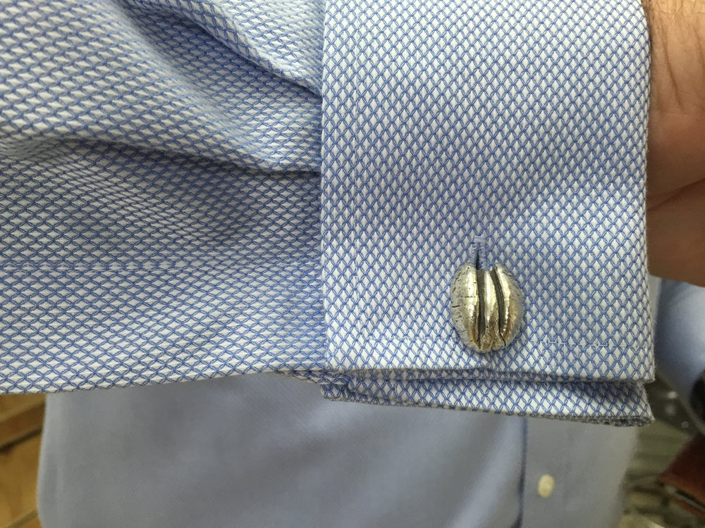 Man Wears MIMOSA Handcrafted Pecan Cufflinks in Sterling Silver