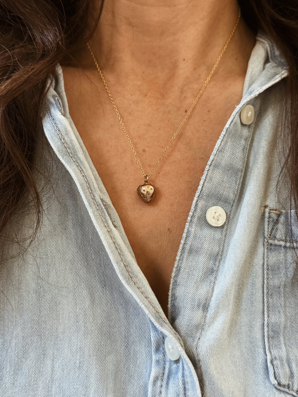 Woman Wears the Large MIMOSA Handcrafted Strawberry Pendant in Bronze