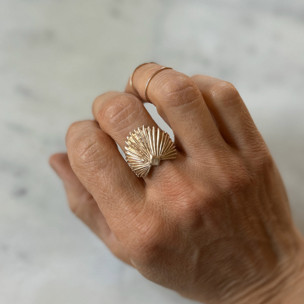 Person Wearing a Bronze Palmetto Leaf Ring