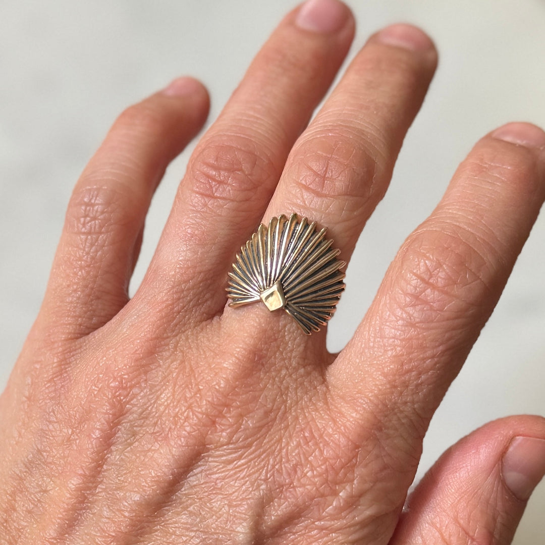 Person wears a Bronze Palmetto Ring from MIMOSA Handcrafted