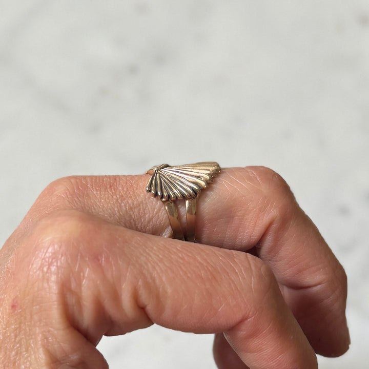 Person wears a Bronze Palmetto Ring from MIMOSA Handcrafted