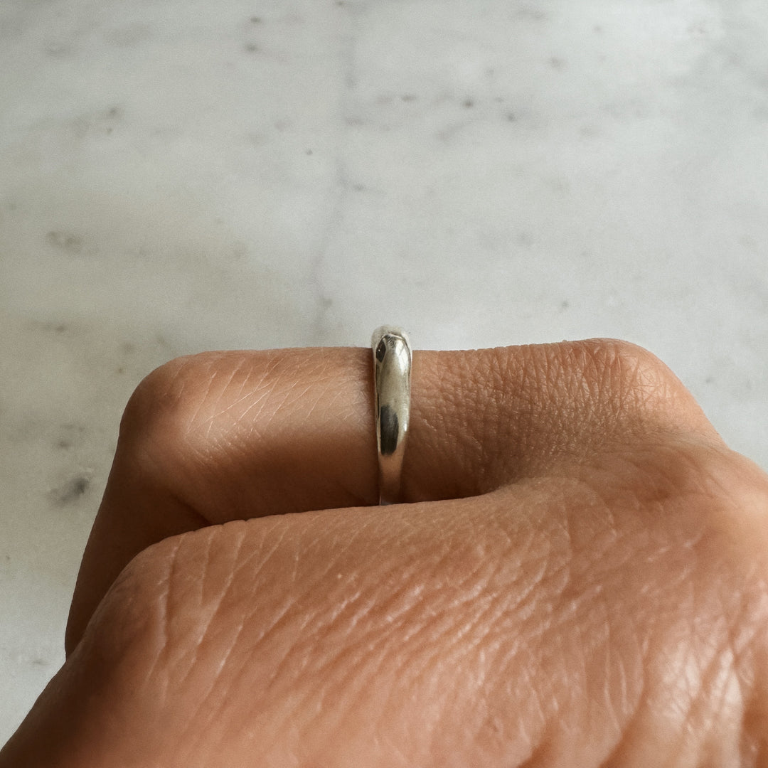 Person Wears the MIMOSA Handcrafted Petite Amanda Dome Ring in Sterling Silver