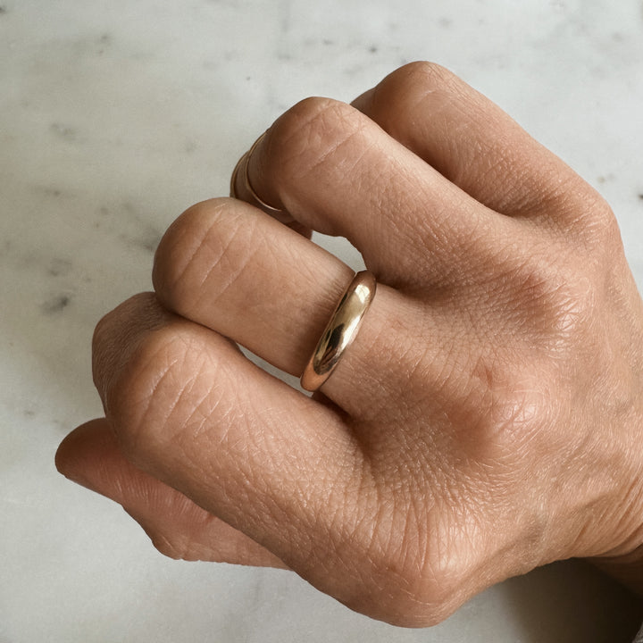 Person Wears the MIMOSA Handcrafted Petite Amanda Dome Ring in Bronze