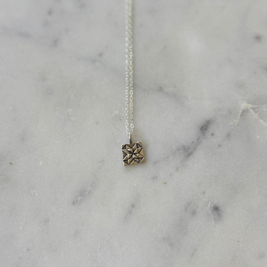 Handmade quilt square necklace in sterling silver by MIMOSA Handcrafted