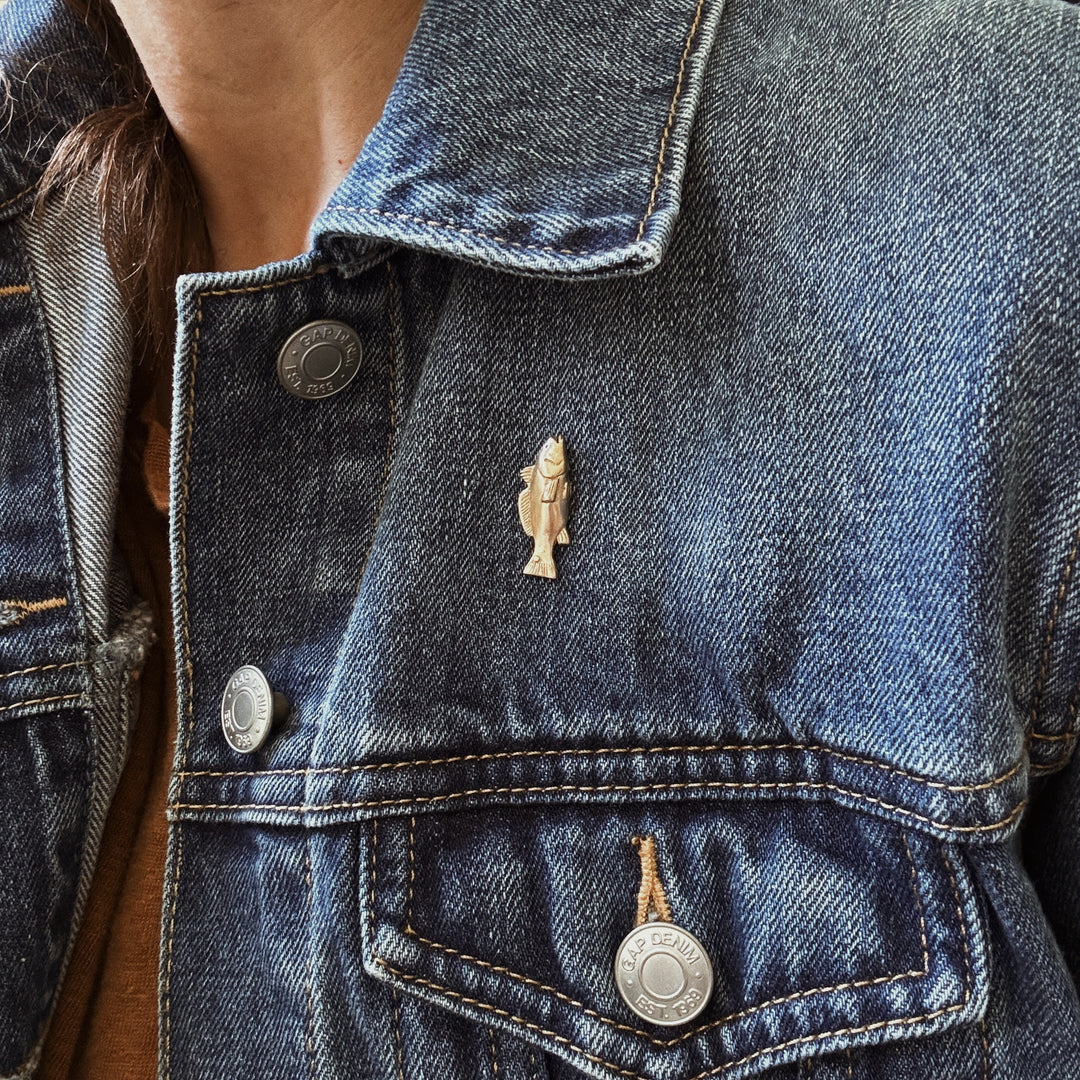 Person Wears the MIMOSA Handcrafted Redfish Pin