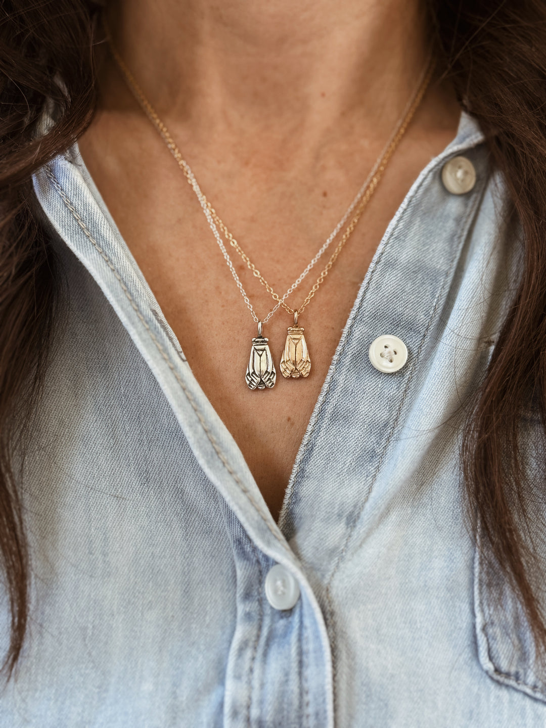 Woman Wears the MIMOSA Handcrafted Small Cicada Pendants in Bronze and Sterling Silver