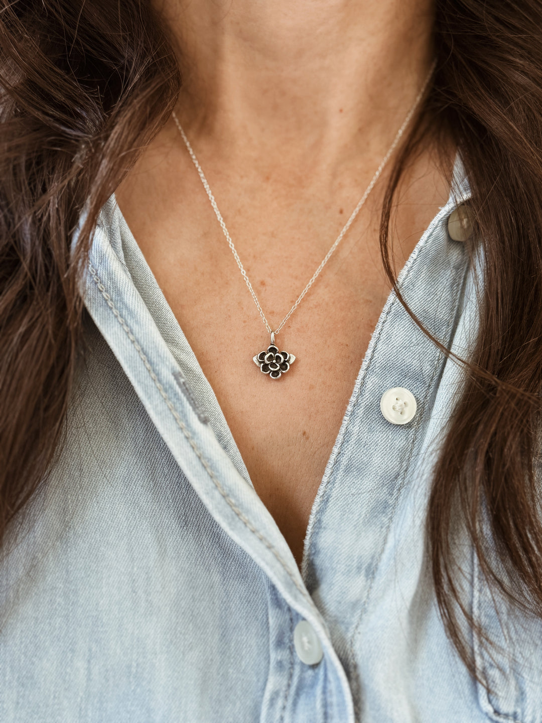 Woman Wears the MIMOSA Handcrafted Small Magnolia Flower Pendant in Sterling Silver