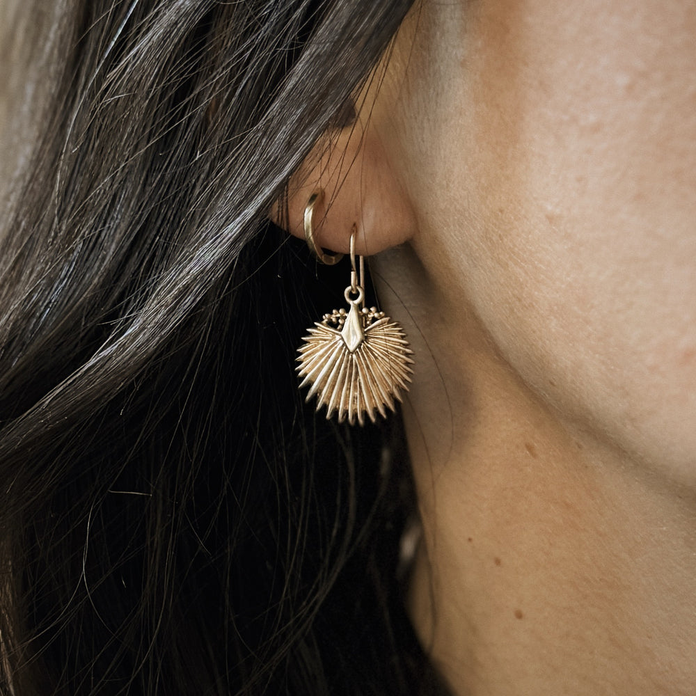 Person Wears Bronze Palmetto Leaf Earrings on Gold-Filled Ear Wires