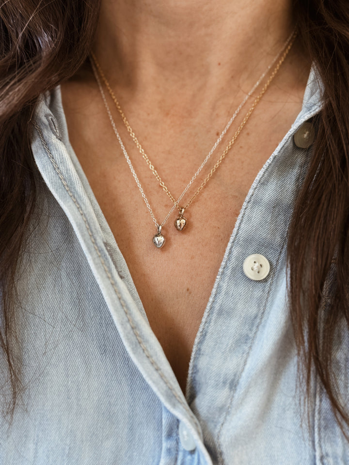 Woman Wears the MIMOSA Handcrafted Small Strawberry Pendants in Bronze and Sterling Silver