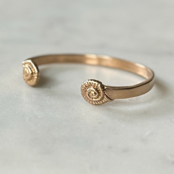 Bronze Bracelet with Spiral Snail Shell Design
