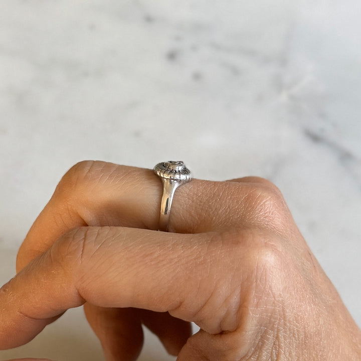 Person Wears Sterling Silver Snail Shell Ring on Middle Finger