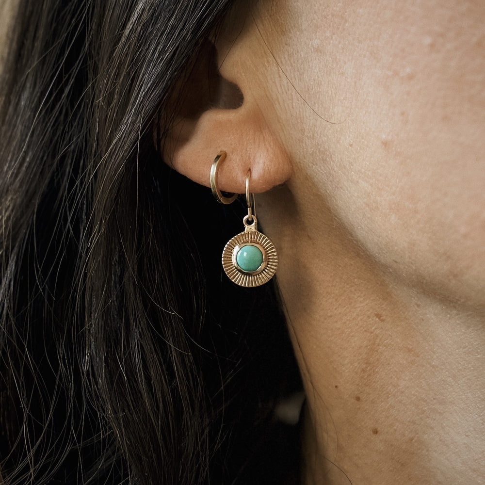 Woman Wears Bronze and Turquoise Sunburst Earrings | MIMOSA Handcrafted