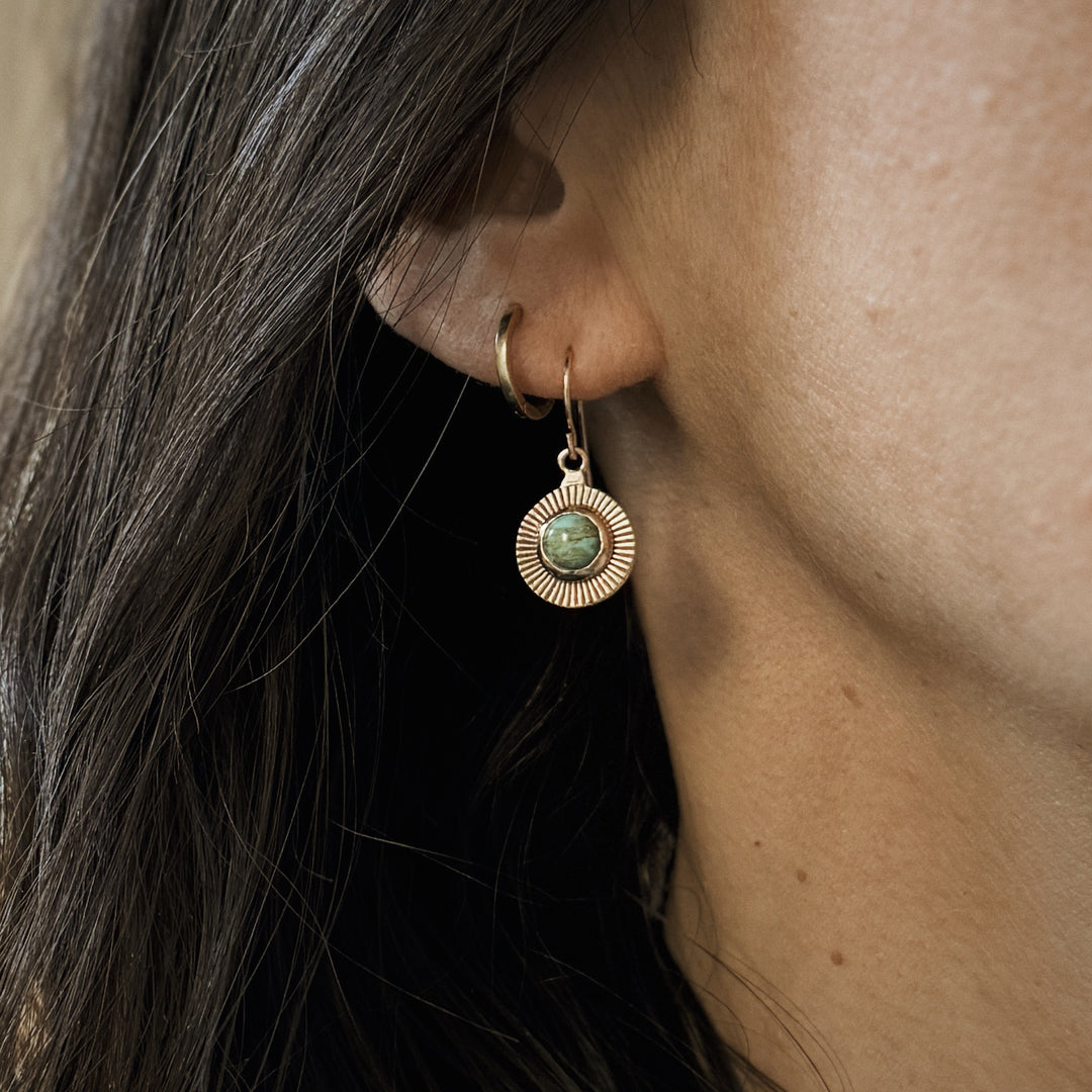 Woman Wears Bronze and Turquoise Sunburst Earrings | MIMOSA Handcrafted