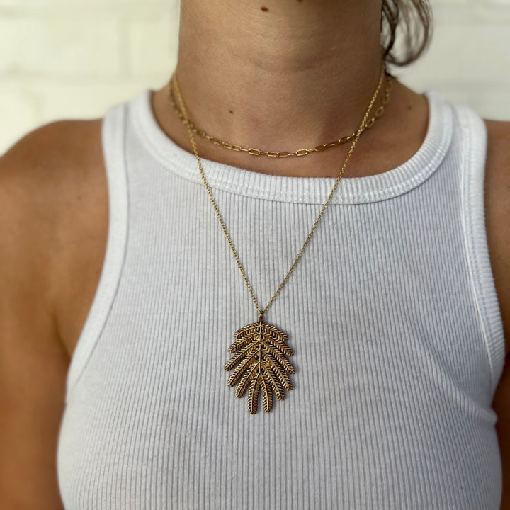 Woman Wearing Handcrafted Mimosa Tree Leaf Pendant Necklace