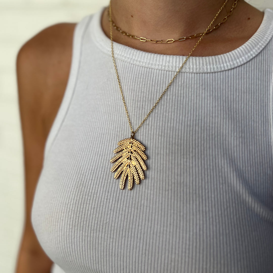 Woman Wearing Handcrafted Mimosa Tree Leaf Pendant Necklace