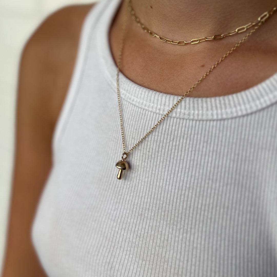 Woman Wearing Handcrafted Mushroom Pendant Necklace