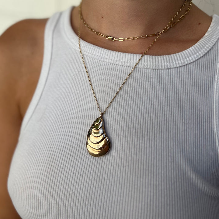 Woman Wearing Handcrafted Oyster Pendant Necklace