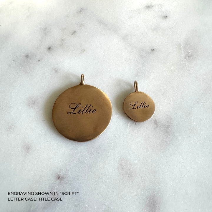 Large and small round bronze pendants engraved with the name &