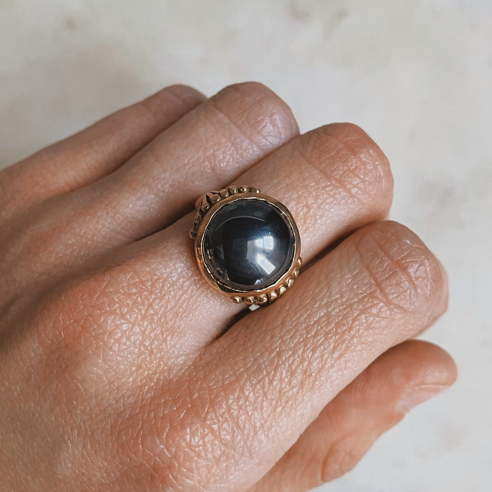 MIMOSA Handcrafted Bronze Mimosa Flower Ring with Hematite